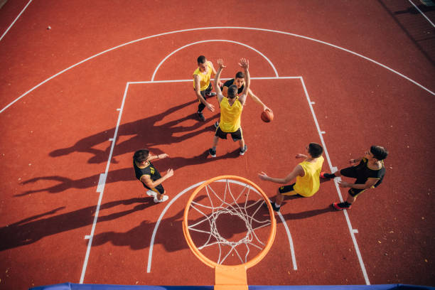 istock Group of players playing basketball 1178610955