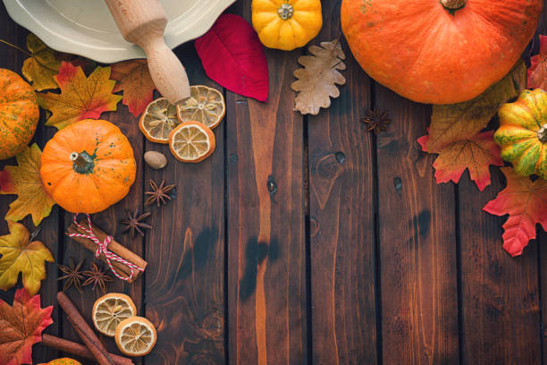istock Autumn background with pumpkins and spices 1178613884