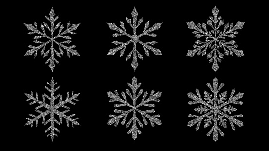 Set of beautiful shiny complex Christmas snowflakes made of sparkles in silver colors