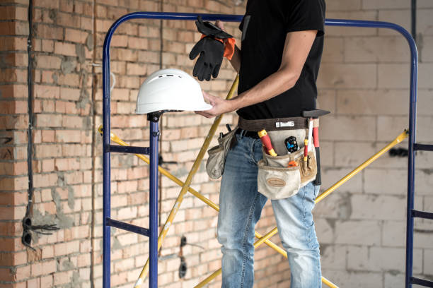istock Builder handyman with construction tools. House and house renovation concept. 1178616491
