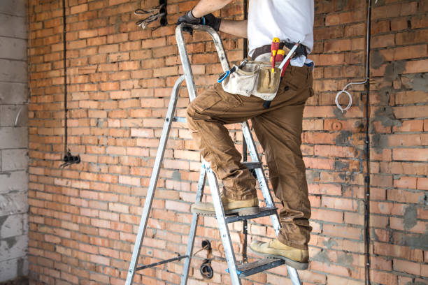 istock Electrician with tools, working on a construction site. Repair and handyman concept. 1178616502