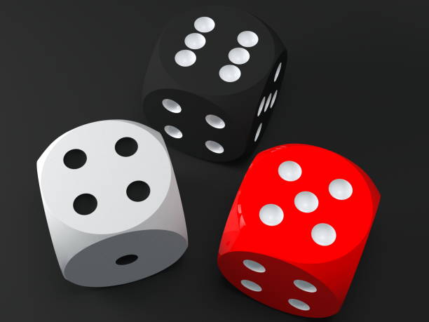 istock Dices in various colors on black background 1178617959