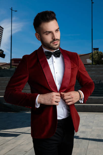 istock concerned young elegant man arranging coat outside 1178619387