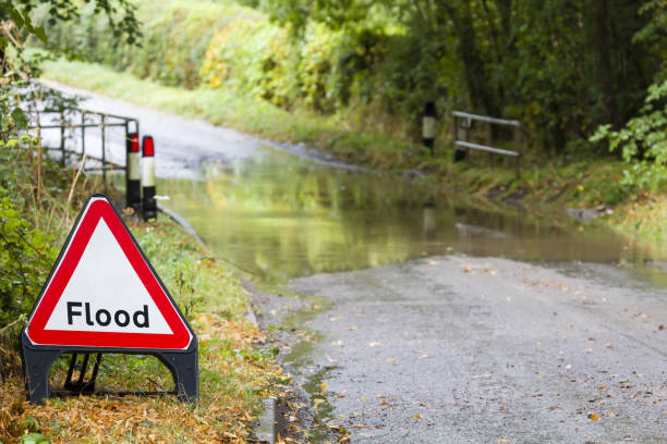 istock Flooded road in England, UK 1178619631