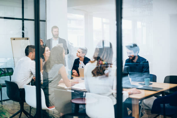 istock Young manager leading the meeting in the office 1178621057