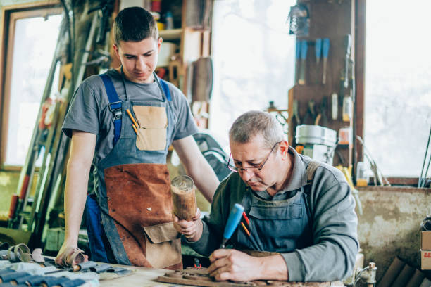 istock Father and son carpenters 1178621070