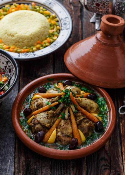 istock Slow cooked chicken with carrots, morrocan tajine, rustic style 1178622273