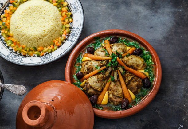 Chicken tajine with couscous and salad, morrocan cuisine stock photo