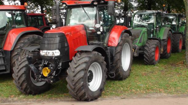 istock Tractor Agricultural Machinery Including Tree Scenery 1178622464