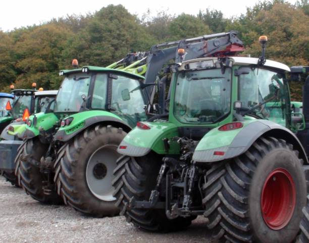 istock Tractor Agricultural Machinery And Tree Scenery 1178622623