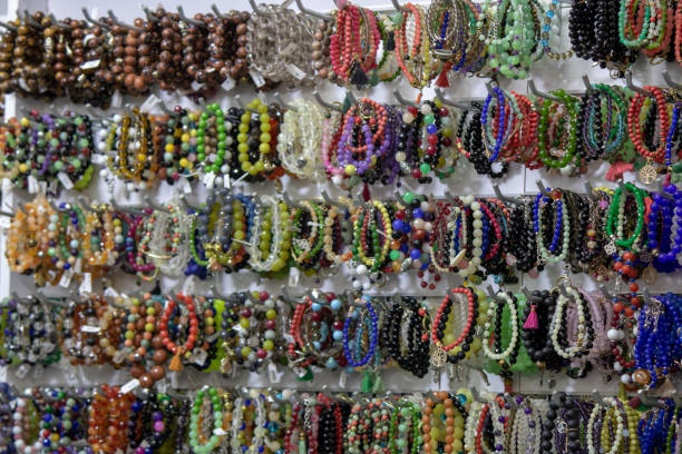 Close up of beads hanging on counter.