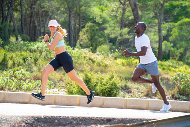 istock Couple multi ethnic running forest in a race 1178646970