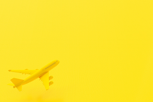 Airplane flying on yellow background. minimal idea concept, 3D Render.