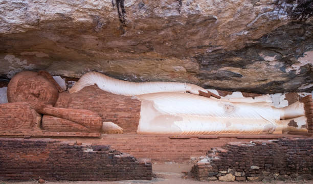 istock Sleeping Buddhism statue at the Pidurangala mountain, Sri Lanka. 1178654307