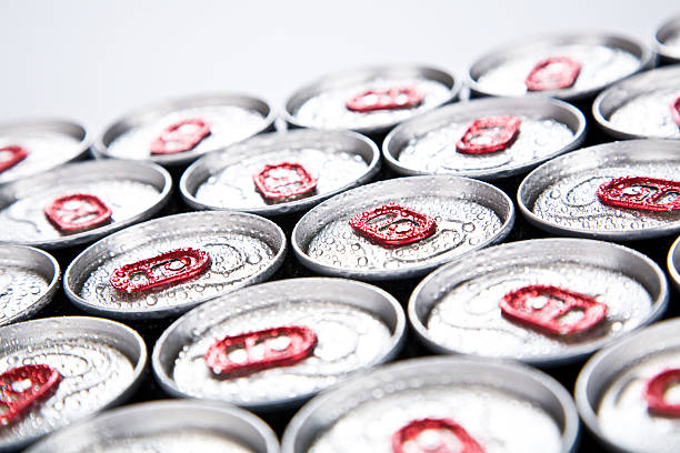 Soda cans lined up with condensation on top Drink Can drink can stock pictures, royalty-free photos & images
