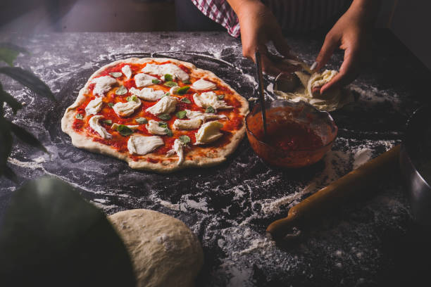 istock making Italian pizza at home 1178665539