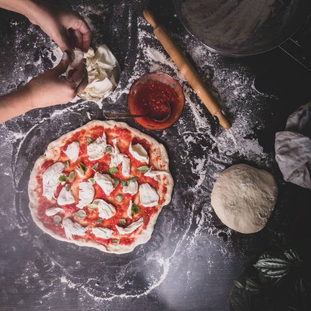 istock making Italian pizza at home 1178665544