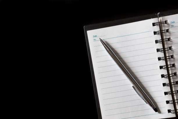 istock Top view of Pen, notebook on black background and copy space 1178672164