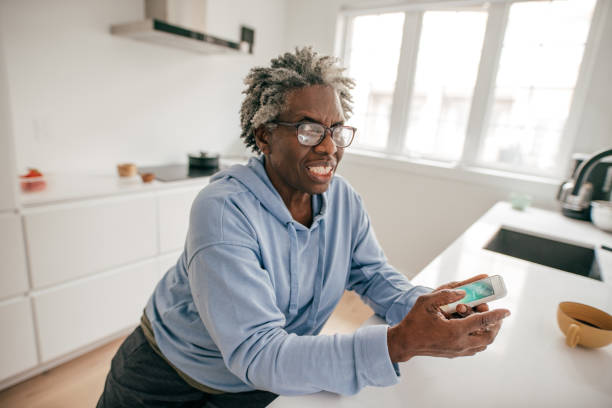 istock Senior woman talking to smartphone app 1178672437