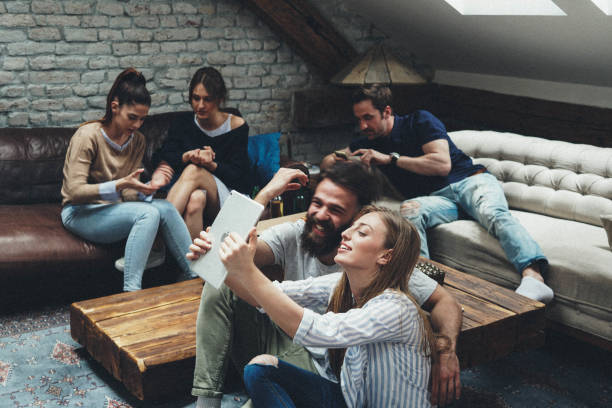 istock Five hipster friends chilling out at the apartment 1178673510