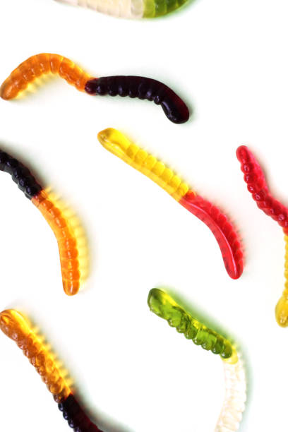 istock Colorful gummy worms isolated on white 1178679878