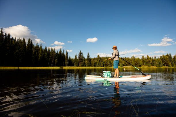 istock stand up paddle fishing 1178680954