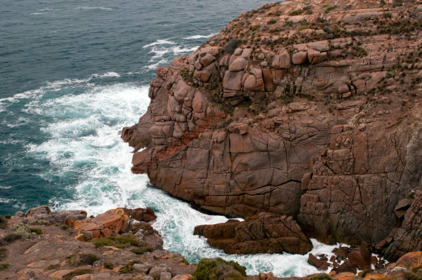 istock Breaking waves at bottom of cliff 1178681188