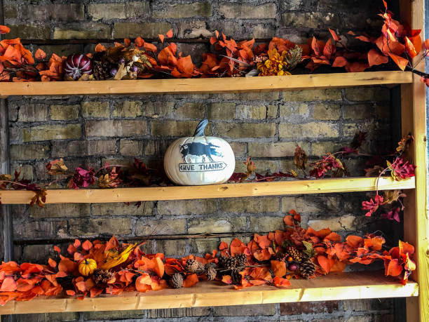 istock Colorful leaves and white pumpkin fall decoration 1178681959