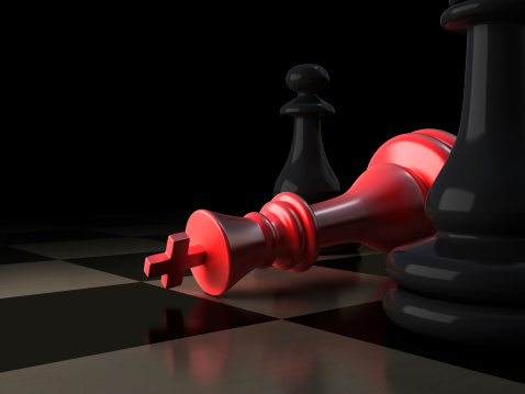 The red king lies on chessboard. Black background. High quality 3d render.