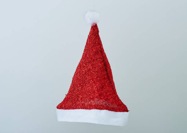 istock Santa red hat isolated in gray background 1178685050