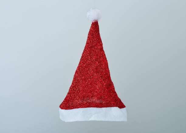 istock Santa red hat isolated in gray background 1178685055