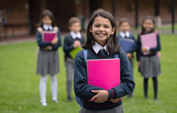 istock Young female student looking very happy at the school 1178693983