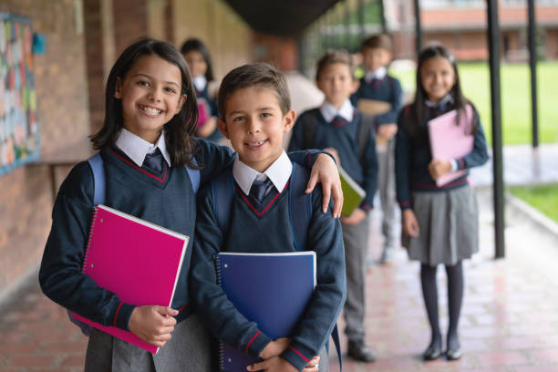 istock Happy students looking very happy to be back to school 1178694004