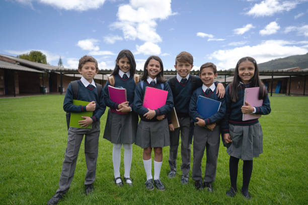 istock Happy group of Latin students at the school 1178694058