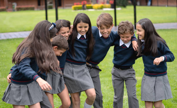 istock Happy kids having fun playing on their break at school 1178694093