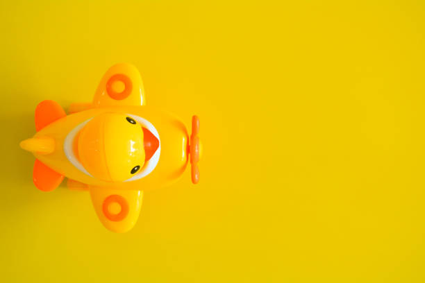 istock Yellow plane isolated on a yellow background. 1178696936