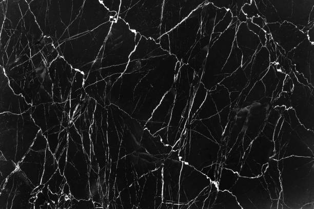 istock Dark black marble nature texture with white vein patterns abstract for background 1178698159