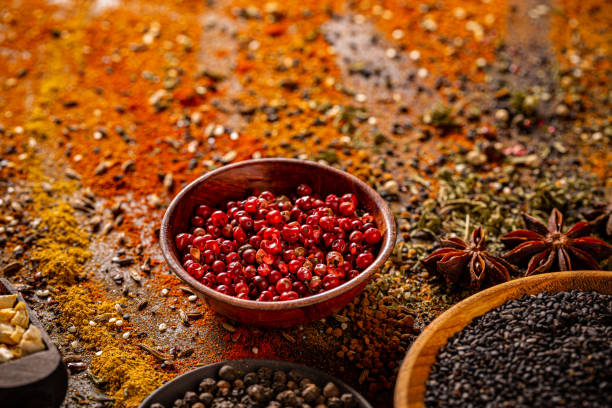 istock Red peppercorn in wooden bowl 1178710985