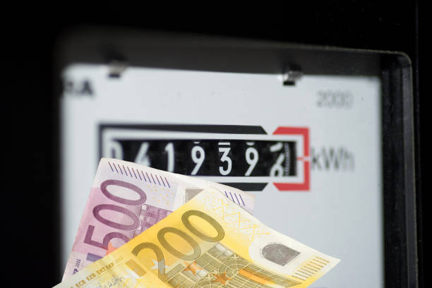 electricity meters, euro money and price for electricity - meter electric meter electricity fuel and power generation imagens e fotografias de stock