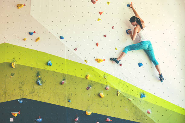 istock Woman in boulder gym. 1178713212