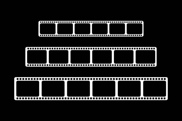 istock Three white video films of different sizes are shown on a black background. 1178716646