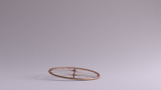 istock Bronze Bicycle Wheel laid down on the ground 1178717266