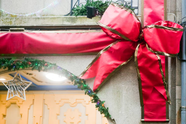 istock Christmas decoration ribbon bow over front door. 1178720180