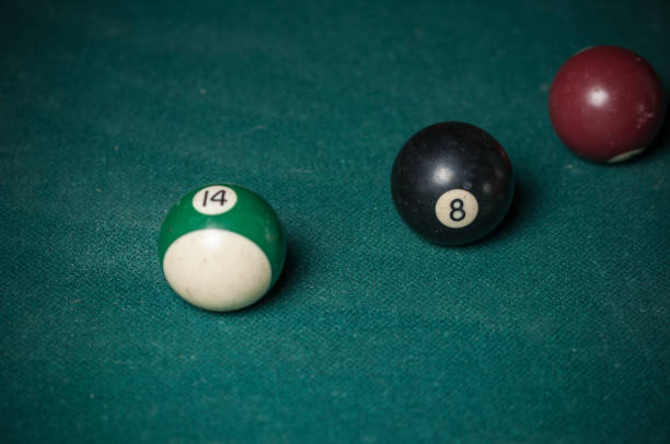 istock Billiards balls and cue on billiards table. Billiard sport concept. 1178720257