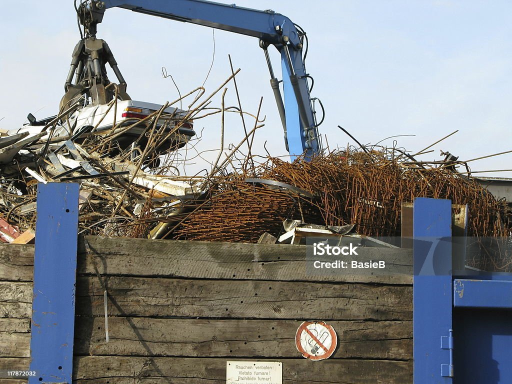 Recycling of cars  Backhoe Stock Photo