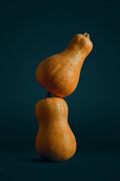 istock Creative minimalistic composition with two orange pumpkin on green background. Halloween holiday concept. Flat lay background. Spooky holiday. autumn harvest 1178720621