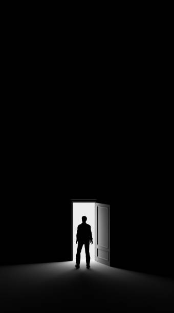 istock Silhouette of a man standing in a dark room lit by bright light. 3d rendering 1178720678