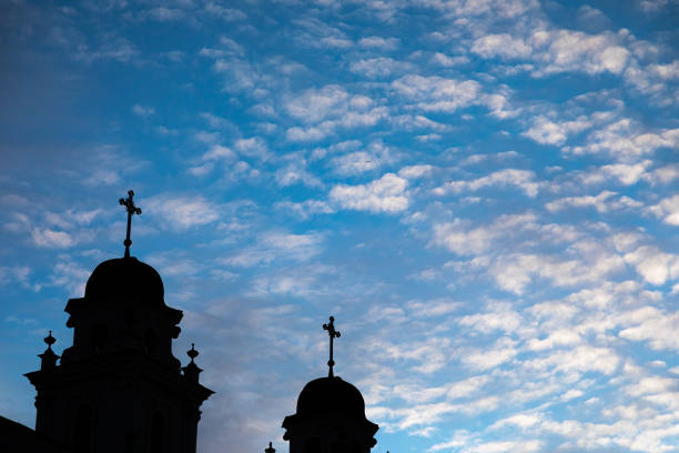 Roman catholic church tips with crosses in centre of city