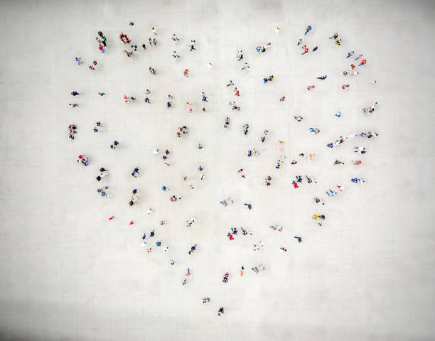 high angle view of people forming a heart - star shape fotos imagens e fotografias de stock