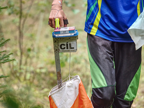 Cil means Target. The las control point in orienteering run race. Popular outdoor sport for all generations.